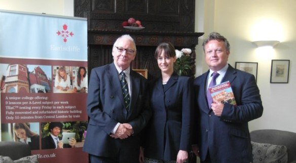"Victoria and Graham present Mr Tim Fish with a copy of Victoria's new book"